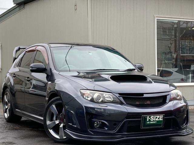 インプレッサ ＷＲＸ　ＳＴｉ　ＷＲＸ　ＳＴｉ（５名）　アプライドＡ　バリスＦバンパー　バリスリアスポイラー　ＢＬＩＴＺマフラー　スモークテール　レカロシート　パナソニックナビ　ＥＴＣ　ＤＣＣＤ　ＨＩＤ　道外仕入車（1枚目）