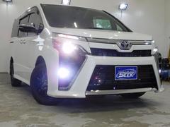 ヴォクシー ZS 煌III 寒冷地仕様両側パワースライドドアトヨタセーフティーセンスLEDヘットランプLEDフォグランプ横滑り防止機能アイドリングストップクルーズコントロールハーフレザーシートエンジンスタータースマートキー 中古車画像