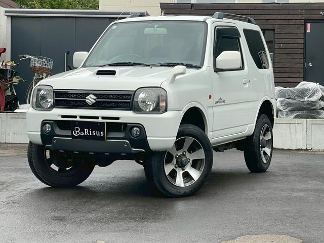 ジムニー ランドベンチャー　４ＷＤ　バックカメラ　ナビ　アルミホイール　キーレスエントリー　電動格納ミラー　シートヒーター　ＡＴ　衝突安全ボディ　ＡＢＳ　エアコン　パワーステアリング　パワーウィンドウ　運転席エアバッグ（1枚目）
