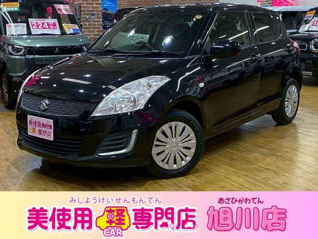 スイフト ＸＧ－ＤＪＥ　４ＷＤ　社外ナビゲーション　スマートキー　プッシュスタート　アイドリングストップ　運転席・助手席シートヒーター　電動格納ミラー　盗難防止システム　衝突安全ボディ　オートエアコン　バニティミラー（1枚目）