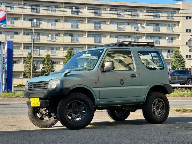 ジムニー ＸＬ　リフトＵＰ　４ＷＤ　本州仕入れ、　ＣＤ再生　ＡＢＳ　パワステ　艶消しカラー　ルーフキャリア　ジムニーキャンプ　車検１年付き（1枚目）