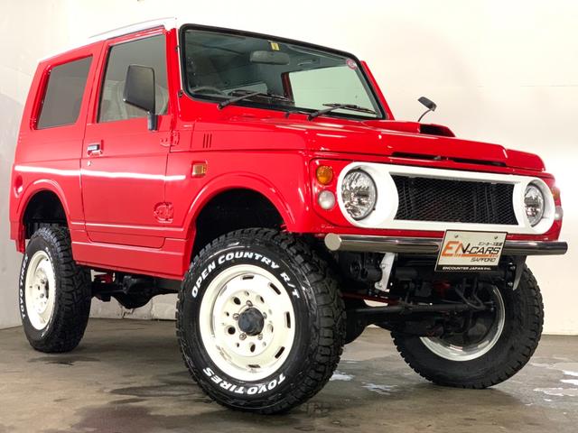 スズキ ジムニーランドベンチャー ｅｎリフトアップカスタム 下廻りノックスドール施工済 前後ステンレスパイプバンパー ｌｅｄテール シートカバー ｔｏｙｏオープンカントリーｒｔ１８５ ８５ｒ１６ ガルシアシスコホワイトの中古車 1998年式 走行9 4万キロ 車体色