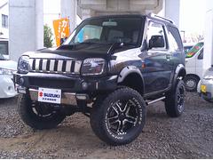 ジムニー ワイルドウインド ターボ リフトアップ MKW16AW ホワイトレターR/Tタイヤ オーバーフェンダー 社外ヘッドライト&テール LEDフォグ&デイライト キノコ型エアクリーナー シートヒーター ミラーヒーター 中古車画像