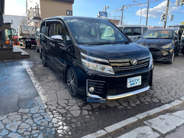 ヴォクシー(トヨタ) ＺＳ　煌　４ＷＤ　車高調　中古夏冬タイヤ付　２０インチアルミホイール　ビッグエックスナビ 中古車画像