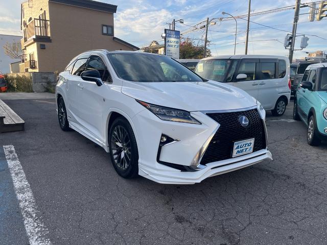 ＲＸ ＲＸ４５０ｈ　Ｆスポーツ　４ＷＤ　ＴＲＤフルエアロ　ＴＲＤマフラー　ローダウン　パノラマルーフ　三眼ＬＥＤヘッドライト　マークレビンソンスピーカー　パノラミックビューモニター　寒冷地仕様　シートベンチレーター　シートヒーター　４ＷＤ（1枚目）