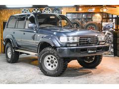 ランドクルーザー80 VXリミテッド 社外AW・MTタイヤ・社外マフラー・ブラウンレザー調シートカバー 中古車画像
