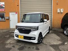 N-BOXカスタム  4WD フルフラット チップアップシート ベンチシート スマート キーレス クリアランスソナー オートライト 頸部衝撃緩和ヘッドレスト アイドリングストップ 盗難防止システム アイドリングストップ 中古車画像