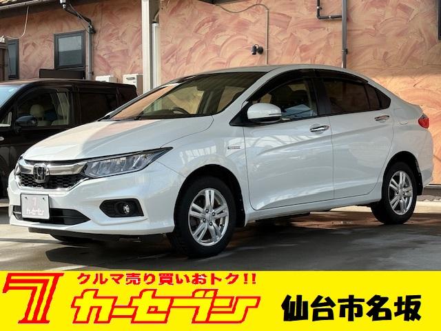 ハイブリッドＥＸ・ホンダセンシング　４ＷＤ　純正Ｂｌｕｅｔｏｏｔｈ対応ナビ　フルセグＴＶ　バックカメラ　ＥＴＣ　ハーフレザーシート　運転席＆助手席　シートヒーター　ＬＥＤヘッドライト　パドルシフト　フロントフォグ　スペアキー