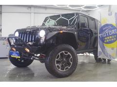 ジープ・ラングラーアンリミテッド ルビコン ハードロック 4WD/特別仕様車/事故無/リフトアップ/カスタムオーバーフェンダー/USサイドマーカー/アクスルロック/スウェイバー/レザーシート/シートヒーター/テールレンズガード/社外ナビ/フルセグ 中古車画像