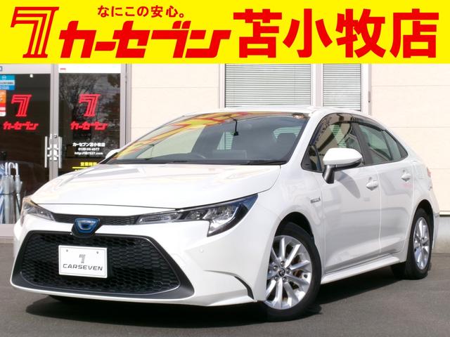 カローラ ハイブリッド　Ｓ　４ＷＤ　衝突被害軽減ブレーキ　寒冷地仕様　オートハイビーム　横滑り防止装置　バックカメラ　純正ナビ　フルセグＴＶ　ブラインドスポットモニター　クルーズコントロール　レーンディパーチャーアラート（1枚目）