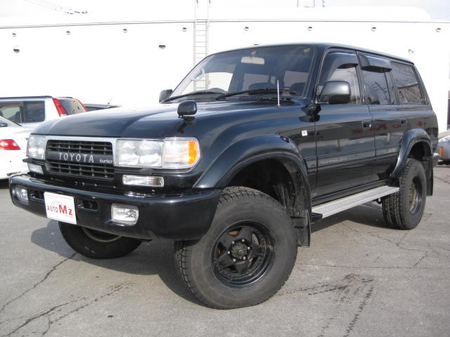 トヨタ ランドクルーザー８０ その他 ｖｘリミテッド ２インチリフトアップ センターデフロック ヒッチメンバー 社外１８メッキアルミ付マッドタイヤ積込 社外エンジンスターター サンルーフ 皮調シートカバー ｅｃｔ ｅｔｃ バックモニター スペア キーの中古車在庫詳細