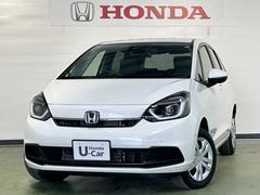 フィット e:HEVホーム 当社使用レンタカー 純正9インチナビ 夏冬タイヤ付 ドラレコ TVフル リアカメラ ETC 中古車画像