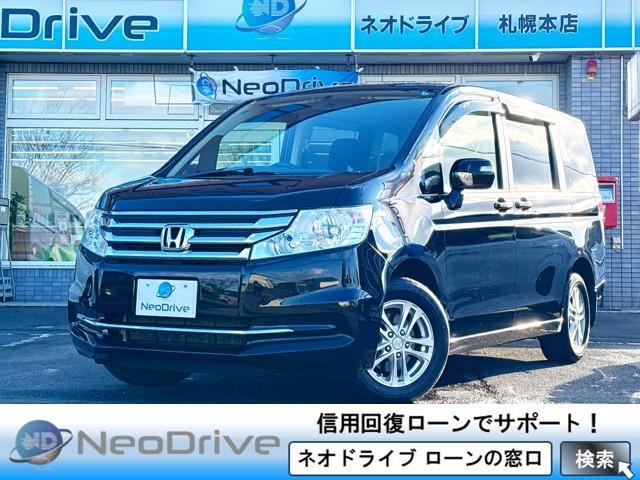 ステップワゴン（ホンダ）Ｇ　Ｅセレクション　４ＷＤ　本州仕入　寒冷地仕様　純正ナビ　Ｂｌｕｅｔｏｏｔｈ接続　後席モニター　パワスラ　アイドリングストップ　社外アルミ　横滑り防止　スマートキー　３列シート　タイミングチェーン車　Ｂカメラ　フルセグ 中古車画像