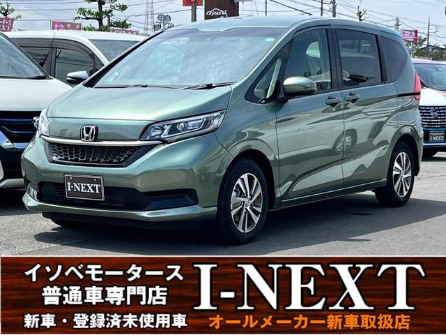 フリード＋ハイブリッド ハイブリッドＧ　登録済未使用車／ホンダセンシング／Ｓパッケージ付き／バックカメラ／ＬＥＤヘッドライト／純正１５インチＡＷ／シートヒーター／両側パワースライドドア／衝突被害軽減ブレーキ／オートライト／ＡＣＣ／（1枚目）