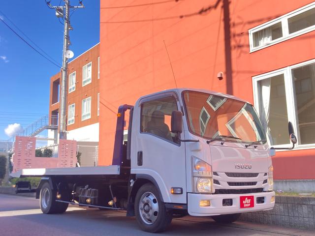 いすゞ エルフトラック 　☆積載車☆車両運搬車☆極東フラトップＺＥＲＯ☆積載３０００ｋｇ☆荷台内寸：２０７×５７０☆ラジコン付☆３ペダル６速マニュアル☆電格ミラー☆集中ロック☆ＥＴＣ☆３０００ｃｃターボ☆２１５　７０Ｒ１７．５