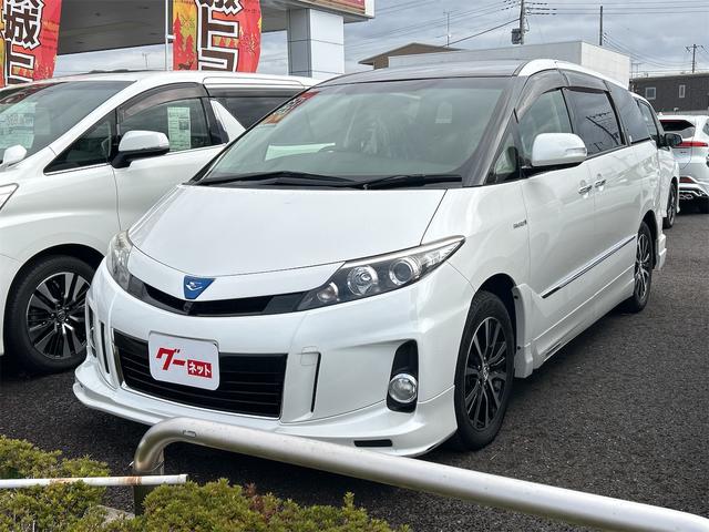 エスティマハイブリッド(トヨタ) アエラス　４ＷＤ　ＥＴＣ　全周囲カメラ　ナビ　ＴＶ　オートクルーズコントロール　両側電動スライドドア　オートライト　ＨＩＤ　サンルーフ　電動リアゲート　電動格納サードシート　スマートキー　アイドリングストップ 中古車画像
