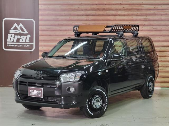 Ｆ　自社新車仕入れ　４ＷＤ　リフトアップ　ヴィンテージ新品ホイールＴＯＹＯオープンカントリーＲ／Ｔ新品タイヤ　ルーフラック　デニムシートカバー　ウッドコンビステアリング　前後ライトカバー　前後席電動開閉窓(1枚目)