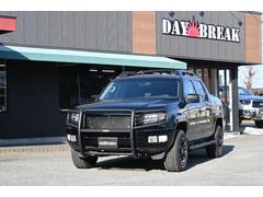 リッジライン  SPORT 自社輸入 中古並行 実走行 XD18インチ スタドレス グリルガード メッシュグリル リフトアップ サイドステップ ルーフレール トノカバー パナソニックナビ ETC 国内2オーナー 中古車画像