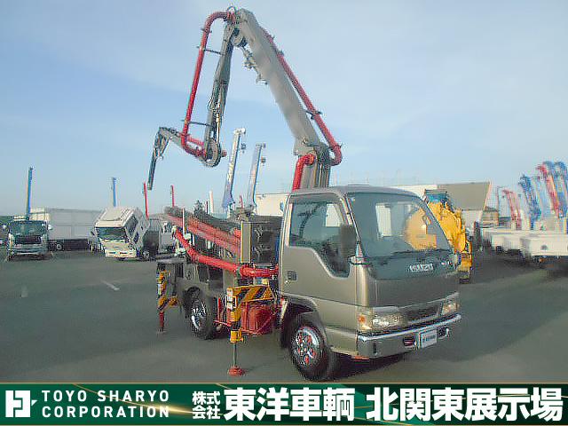 エルフトラック 　コンクリートポンプ車　上物極東開発製　上物型式ＰＨ３５－１１　真空スクイーズ式　３段屈折式ブーム　地上高１１．４ｍ　３６０°全旋回　ラジコン２個あり（無線）　走行６万ｋｍ（1枚目）
