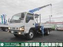 １３６５４［クレーン付平ボディ］　Ｈ１８　エルフ ４段ラジコン　ワイドロングボディ　積載３ｔ　走行１３万ｋｍ　６ＭＴ