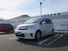 フリードスパイクハイブリッド ジャストセレクション Hondaインターナビ+リンクアップフリージャストセレクション装備ディスチャージヘッドライト(オートライトコントロール付)ドアミラーウィンカーパワースライドドア(リア左側) Sキー キーフリー 禁煙 中古車画像