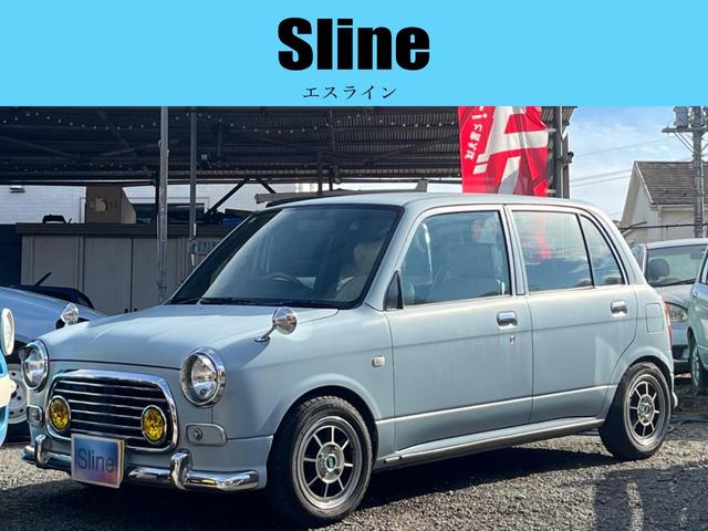 ミラジーノ(ダイハツ) ジーノ　Ｓエディション　５速マニュアル　ＨＡＹＡＳＨＩアルミ　ＮＡＲＤＩウッドステアリング　タイミングベルト交換済み　フェンダーミラー　ＯＰ加工グリル　レザー調シートカバー　ダウンサス　ローダウン　Ｂｌｕｅｔｏｏｔｈ　記録簿 中古車画像