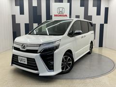 ヴォクシー ZS煌 ワンオーナー LED バックカメラ 地上デジタル TSS 両側パワードア アイドリングストップ車 パワーウィンド 横滑防止 1オーナ Aライト 整備記録簿 DVD可 盗難防止装置 スマートエントリー 中古車画像