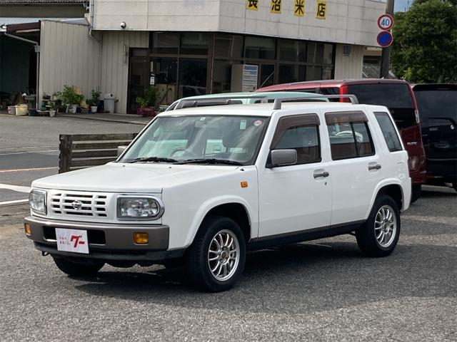 ラシーン タイプＩＩ　４ＷＤ　背面タイヤ　ルーフレール　運転席側エアバッグ　ドアバイザー　リアワイパー　エアコン　パワーステアリング　パワーウインドウ　１４インチアルミ　オートマ車（1枚目）