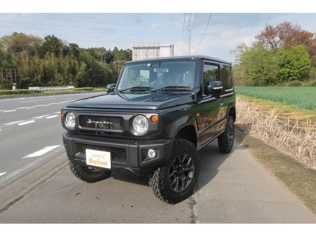 XC 届出済未使用車 リフトアップ カスタムグリル 新品16インチアルミホイール 新品ジオランダーM/Tタイヤ LEDヘッドライト ヘッドライトウォッシャー クルーズコントロール スズキセーフティサポート(1枚目)