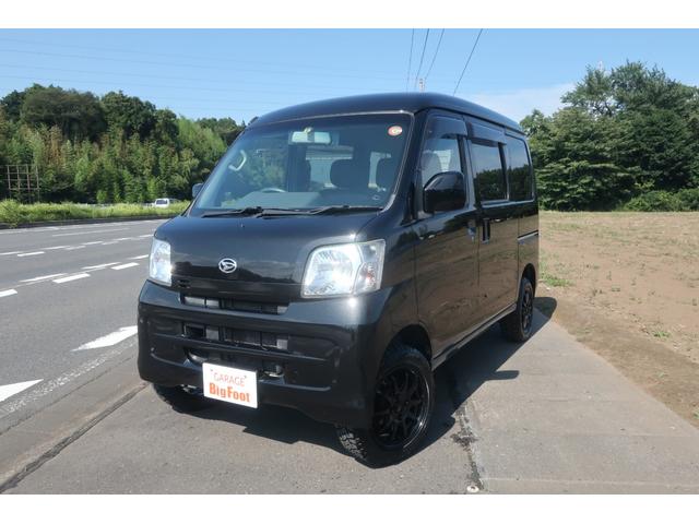 クルーズターボ 4WD リフトアップ 新品14インチアルミホイール 新品オープンカントリー ナビ キーレス オーバーヘッドシェルフ 電格ミラー ヘッドライトレベライザー パワステ エアコン パワーウインドウ ABS(1枚目)
