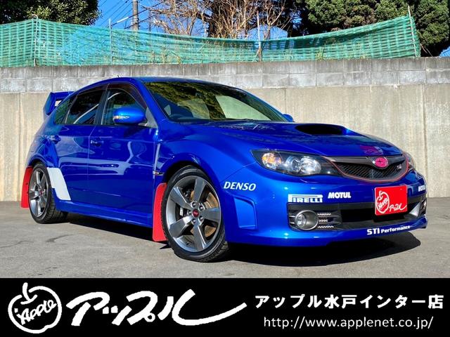 ＷＲＸ　ＳＴｉ　ＧＲＢ／大型リアウィング／純正ウィング有り／０２Ｃ／純正ハーフレザー／クラッチＯＨ済／納車時タイベル交換／ナビ／ＨＩＤヘッドライト／純正１８ＡＷ／ピレリ製スタッドレス／保証書／取説／記録簿／スペアキー