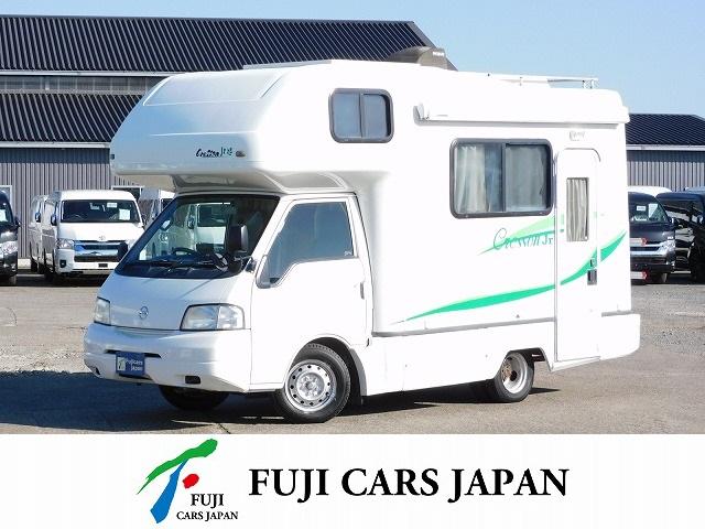 日産 バネットトラック 　キャンピングカー　ナッツＲＶ　クレソンジュニア　１８００ｃｃガソリン車　７名乗車６名就寝　リアＷタイヤ　シンク　ＤＣ式冷蔵庫　ポータブルトイレ　ＦＦヒーター　テレビ　ツインサブＢＴ　外部電源・充電器