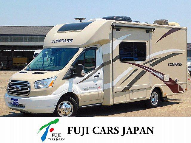 フォードその他 　トランジット　コンパス２３ＴＫ　電動スライドアウト　３２００ｃｃディーセルターボ適合車　６名乗車４名就寝　ルーフエアコン　発電機　温水ボイラー　トイレ　ＦＦヒーター　テレビ３台　冷蔵庫　電子レンジ