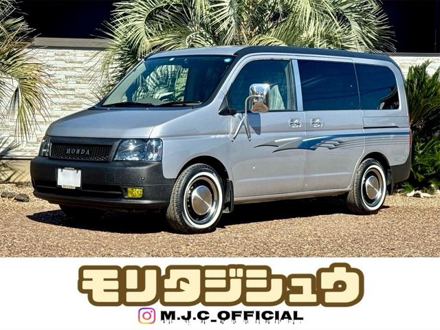 ステップワゴン(ホンダ) I 56130km 車検2年付 回転シート ラプターライナー HONDAグリル クラシックカスタム ホワイトリボン 鉄ちんカスタム アメ車バンミラー サイドデカール スモークヘッドライト スムージング 中古車画像