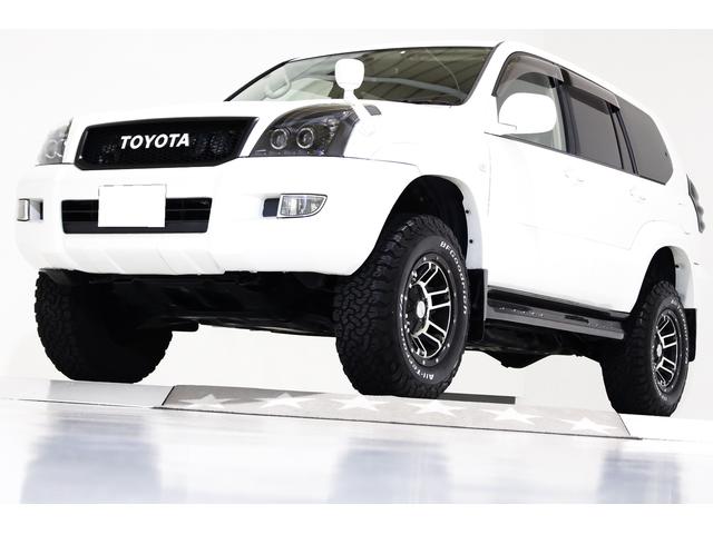 トヨタ ランドクルーザープラド ＴＸリミテッド　４ＷＤ　リフトアップ　新品ダッシュボード交換　ブラックレザー調シートカバー　社外１７インチアルミホイール　イカリングヘッドライト　ＨＤＤナビ　ＴＶ　ＤＶＤビデオ　ＣＤ　バックカメラ　ＥＴＣ　８人乗り