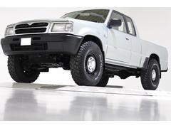 マツダ　プロシード　キャブプラス　４ＷＤ　リフトアップ　リアクロームメッキステップバンパー