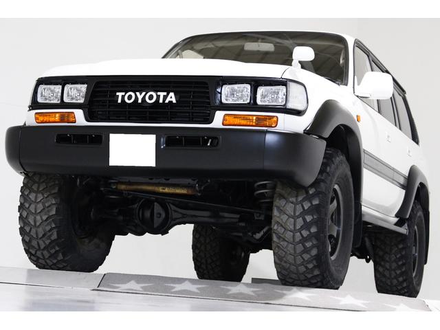 トヨタ ランドクルーザー８０ ＶＸリミテッド　ディーゼル　４ＷＤ　センターデフロック　タイミングベルト交換済　リフトアップ　角目４灯ヘッドライト　レザー調シートカバー　　セルモーター交換済　１６インチＡＷ　アンバー仕様ウィンカー　マーカー　テール