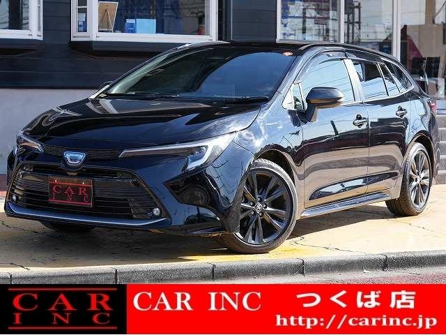 カローラツーリング(トヨタ) ハイブリッド　ダブルバイビー　衝突軽減ブレーキ　レーンアシスト　追従クルコン　ヘッドアップディスプレイ　クリアランスソナー　ブラインドスポット　ステアリングヒーター　純正ナビ　フルセグ　Ｂｌｕｅｔｏｏｔｈ　バックカメラ　ＥＴＣ 中古車画像