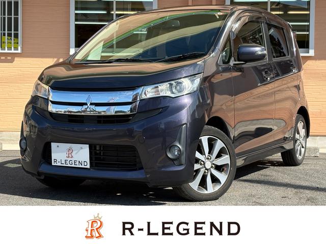 ｅＫカスタム(三菱) Ｔ　タ−ボ車／ＥＴＣ／バックカメラ／ナビ・ＴＶ／Ｂｌｕｅｔｏｏｔｈ／オ−トエアコン／プッシュスタ−ト／スマ−トキ−・スペアキ−／電動格納ミラ−／ドアバイザ−／４人乗り／軽自動車 中古車画像