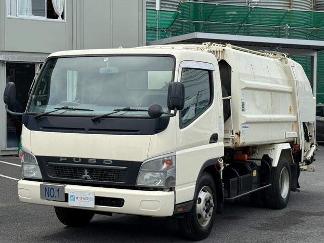 パッカー車　新明和製ＧＴ０５３モデル　プレス式　５．４立米　連続スイッチ付　最大積載量２７００ｋｇ　汚水タンク　ワイドボデー　５速マニュアル　４Ｍ５０エンジン　１５０馬力