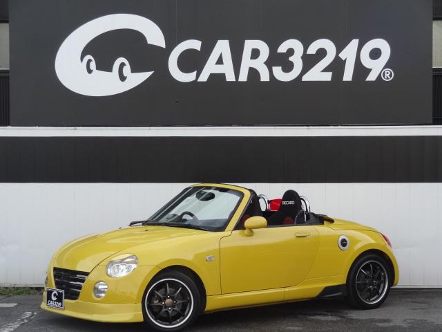 コペン(ダイハツ) ２ｎｄアニバーサリーエディション　５速ＭＴ　電動オープン動作確認済　エアロ　ＲＡＹＳアルミ　Ｄ−ＳＰＯＲＴマフラー　ＢＬＩＴＺDampers　ＲＥＣＡＲＯ　シートヒーター　ＭＯＭＯステアリング　Aftermarketナビ　バックカメラ　ＴＶ　Ｂｌｕｅｔｏｏｔｈ 中古車画像