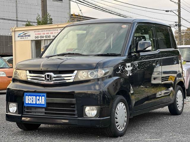 ゼストスパーク（ホンダ）Ｇ　ＥＴＣ　バックカメラ　ナビ　ＴＶ　ＨＩＤ　スマートキー　電動格納ミラー　ベンチシート　ＡＴ　盗難防止システム　ＡＢＳ　ＣＤ　衝突安全ボディ　エアコン　パワーステアリング　パワーウィンドウ 中古車画像