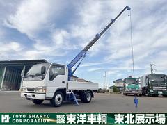 エルフトラック  簡易クレーン付平ボディ 上物タダノ製 4段ブーム ラジコン付(無線) 0.99t吊り 荷台寸法243x162x38 荷台床板張り 積載2t 4ナンバー 5速ミッション 走行11.5万km 中古車画像