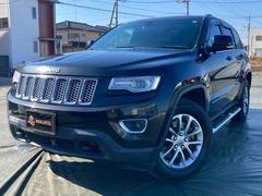 ジープ・グランドチェロキー ラレード メーカーナビ バックモニター 正規DR車 パワーシート前席 純正AW ルーフレール クルーズコントロール プッシュスタート サイドステップ HIDヘッドランプ 4WD フォグ パドルシフト 禁煙車 中古車画像