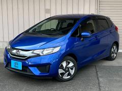 フィットハイブリッド Fパッケージ 純正メモリーナビ プッシュスタート LEDヘッドライト Bluetooth ビルトインETC ドアバイザー 純正ホイール 横滑り防止装置 ABS 中古車画像