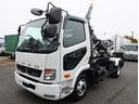 ファイター 新明和製アームロール　ツインホイスト　走行１千ｋｍ　新明和　ＣＣＡ４４－３１　ツインホイスト　キャブバックステップ　２２０馬力　フロア６速　車検有　保証書有　取説有　カラーバックカメラ　Ｂｌｕｅｔｏｏｔｈ付ラジオ　坂道発進補助付（1枚目）