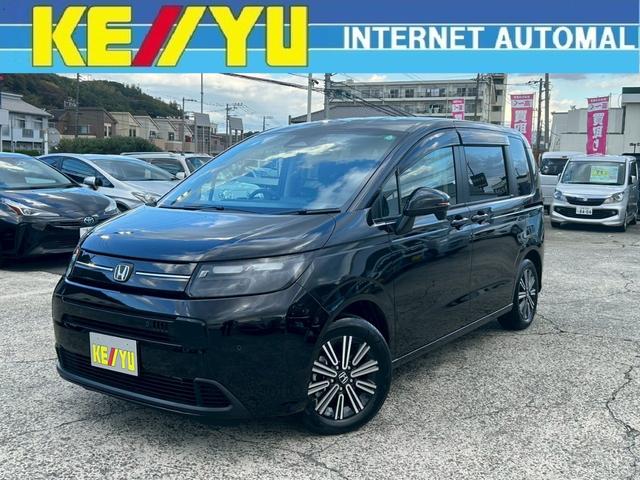 フリード エアー EX【禁煙車/ホンダ純正ナビ】◆純正前後ドラレコ ◆バックカメラ◆BLUETOOTH接続◆コーナーセンサー◆レーンアシスト◆衝突被害軽減システム◆ホンダ純正アルミホイール◆3列シート◆ウォークスルー◆シートヒーター◆電動パーキング◆スペアキー有(1枚目)