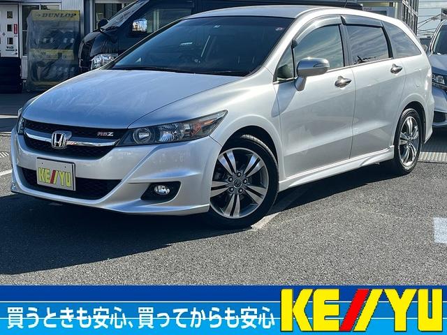 ストリーム ＲＳＺ　６人乗り　純正ナビ　バックカメラ　ＣＤ・ＤＶＤ　ＴＶ　ＥＴＣ　パドルシフト　キーレスエントリー　盗難防止装置　オートエアコン　電動格納ドアミラー　ディスチャージランプ　フォグランプ　純正１７ＡＷ　禁煙