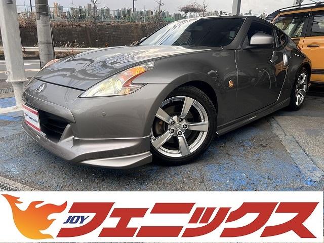 日産 フェアレディＺ ベースグレード　後期・禁煙車・７速モードＡＴパドルシフト・ＨＤＤナビ・ＥＴＣ・ＮＩＳＭＯエアロ（Ｆ・Ｓ・Ｒ・リアスポ）・ＦＲカメラ・ＥＴＣ・ＨＩＤライト・インテリキー・プッシュスタート・純正１８アルミ