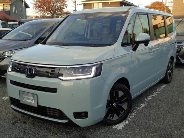 ステップワゴン(ホンダ) ｅ：ＨＥＶエアー　当社デモカー　禁煙車　純正１１．４インチナビ　全周囲カメラ　ＣＤ　ＤＶＤ　Ｂｌｕｅｔｏｏｔｈ　ＬＥＤヘッドライト　ＬＥＤフォグライト　シートヒーター　ブラインドスポット　ＥＴＣ　純正ドライブレコーダー 中古車画像